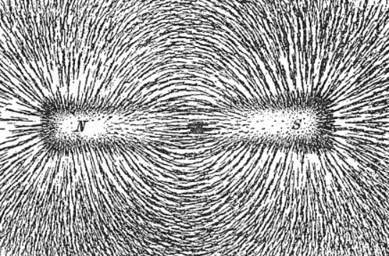 Espectro del campo magnético de un imán recto. Se visualiza el ordenamiento de limaduras de hierro en el entorno de un imán recto.